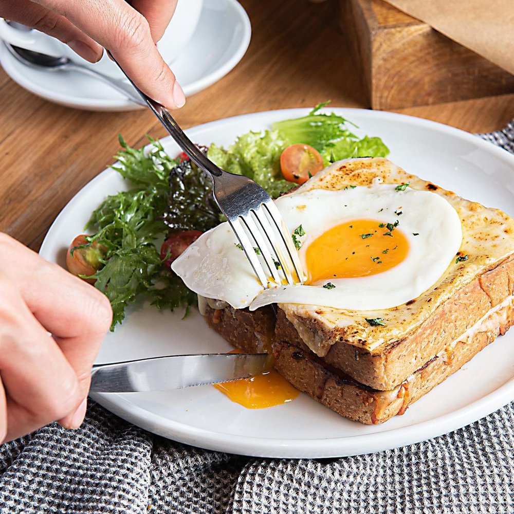 sunnyside egg on top of bread