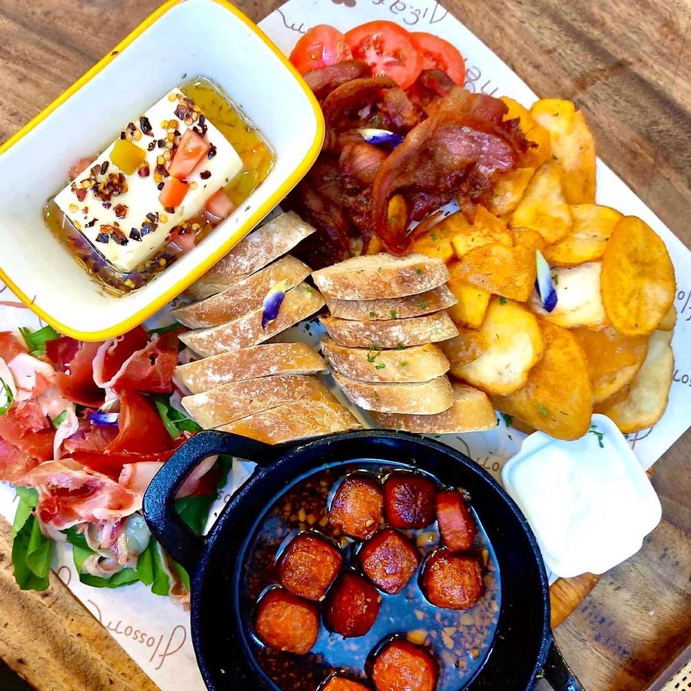 wooden board of spanish tapas