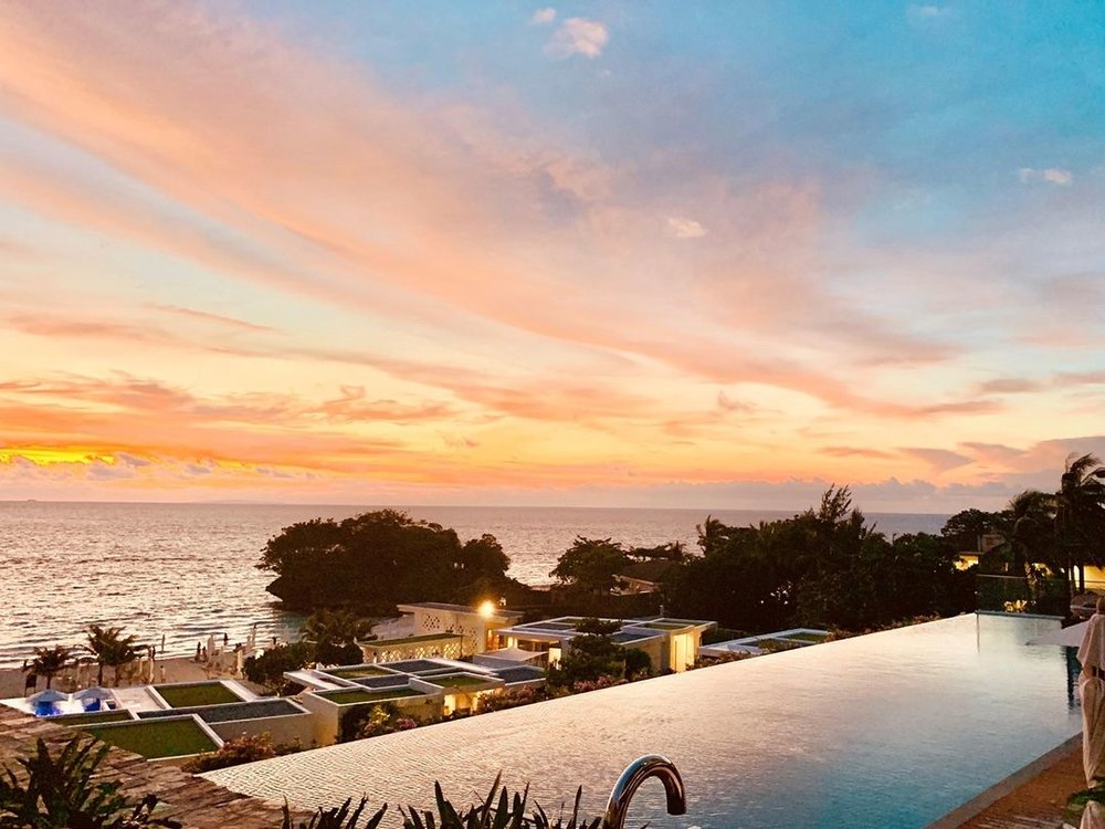 infinity pool overlooking sunset