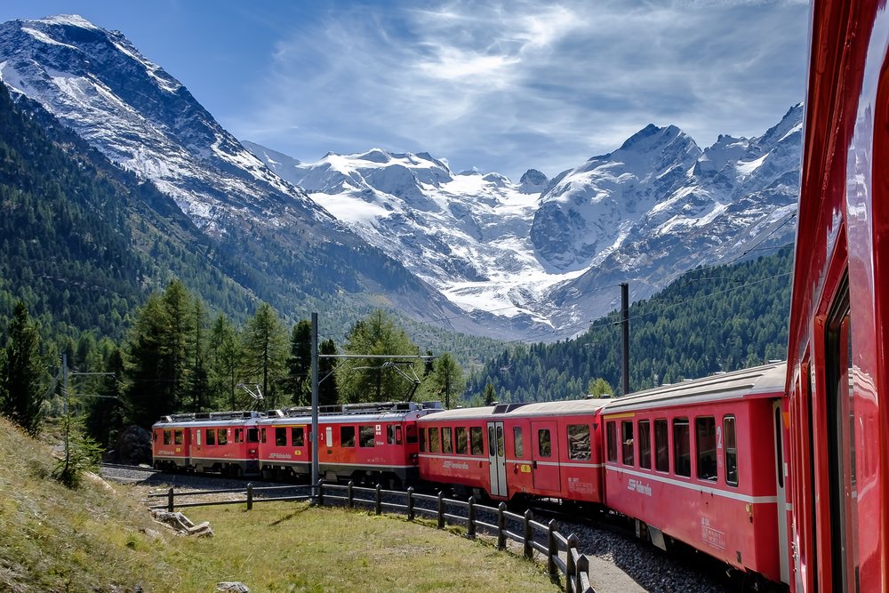 Sit back, relax, and enjoy the views on Switzerland’s panoramic trains. - Credit: Andreas Stutz on Unsplash