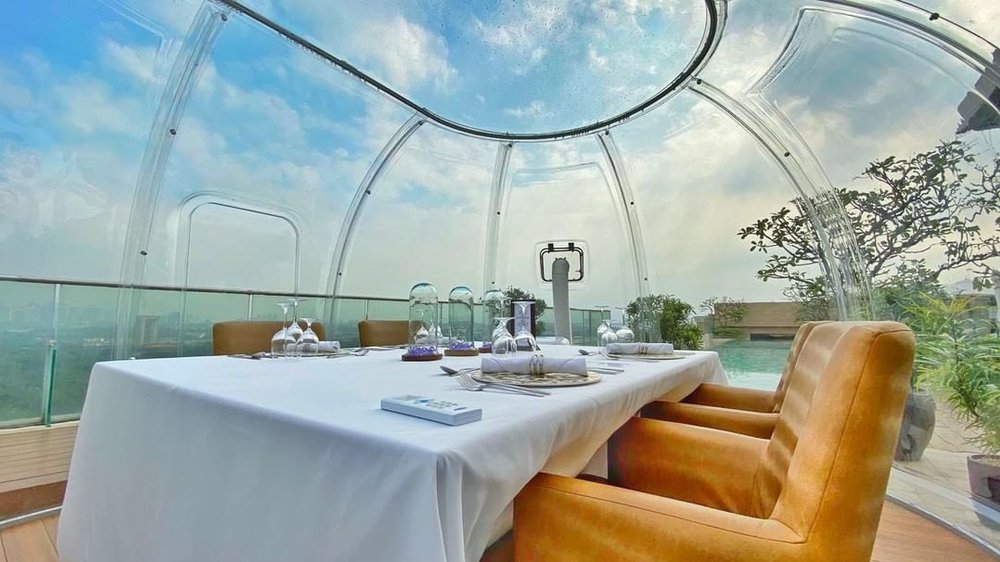 dining table inside glass dome