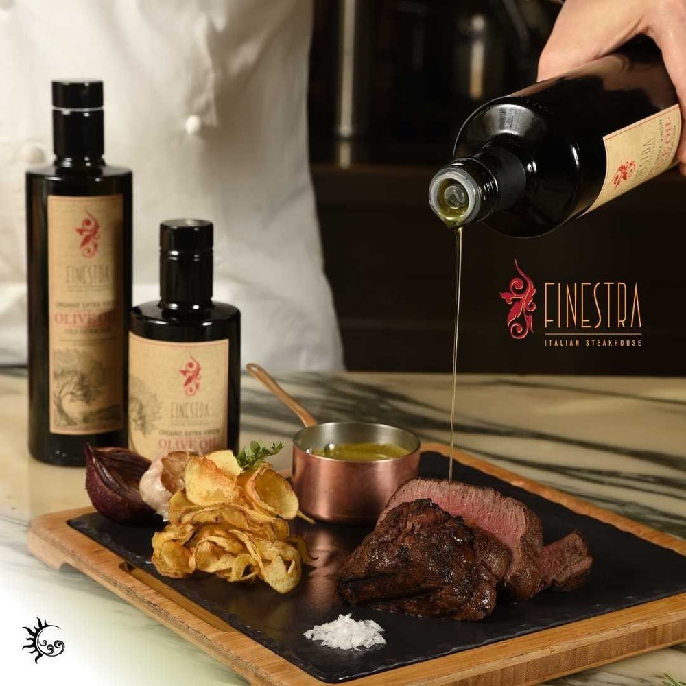 steak and roasted garlic on board