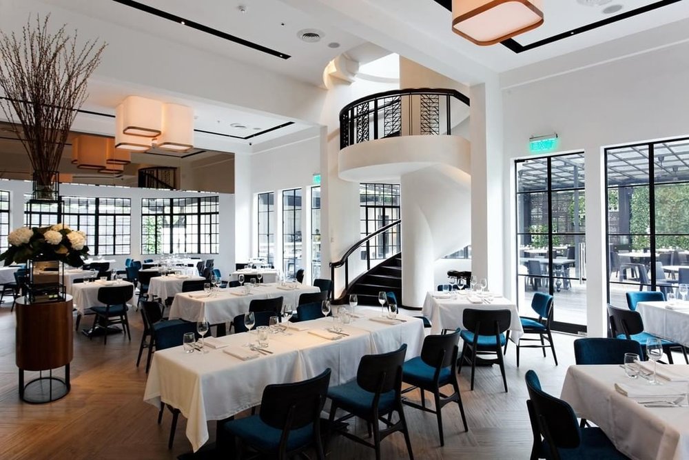 restaurant with white walls and black accents