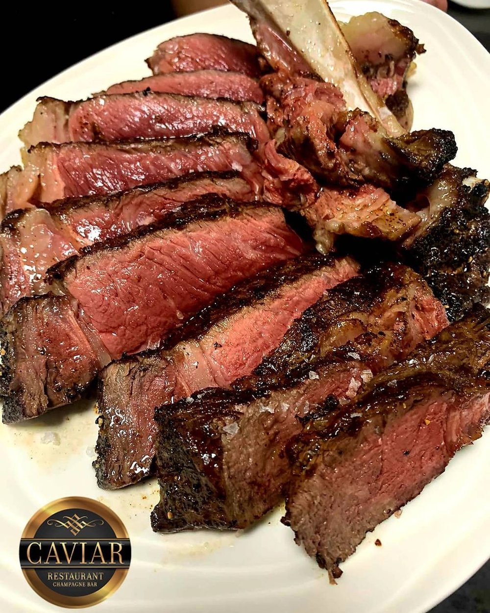 medium well steak strips on plate