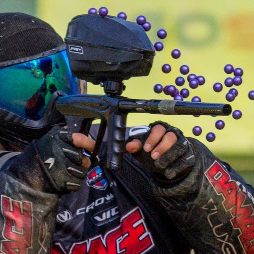 man in masks and gear holding paintball gun