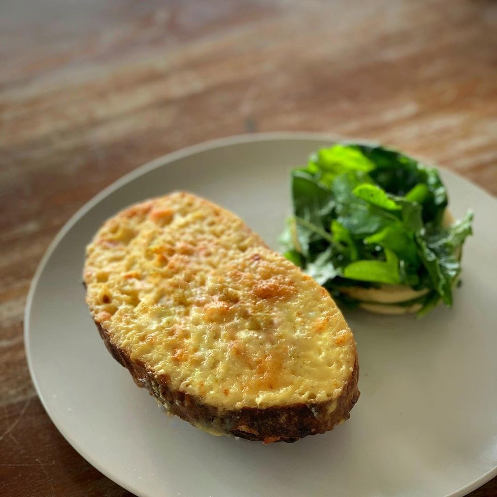 baked potato with cheese topping