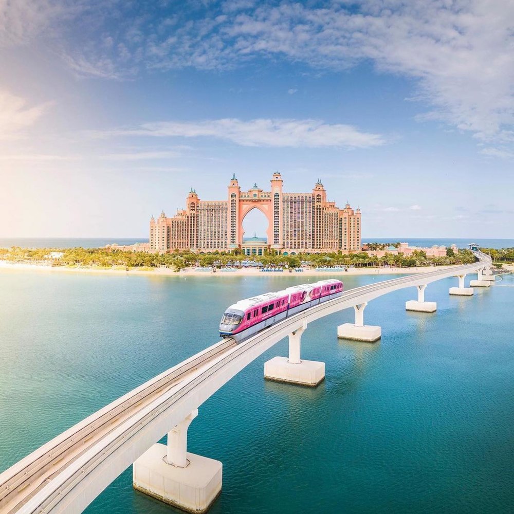 the palm monorail with palm jumeirah in the back