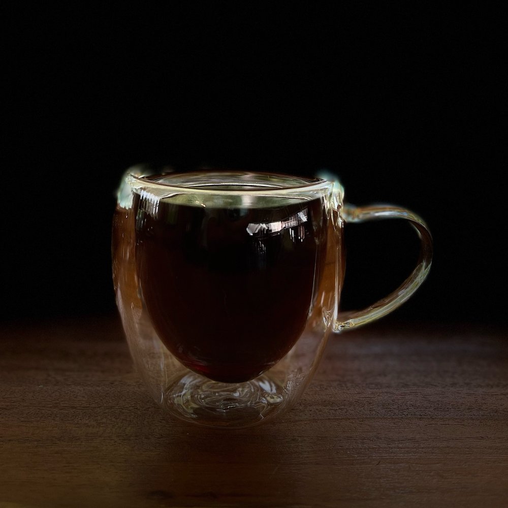 coffee in cup with dark background