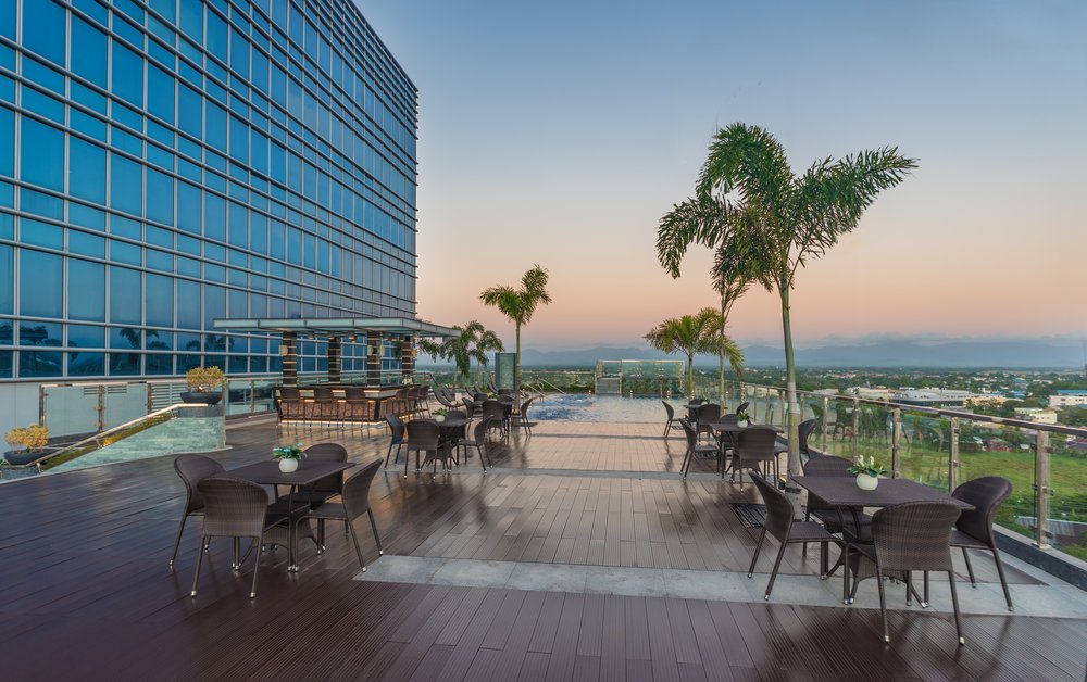 outdoor dining area and pool