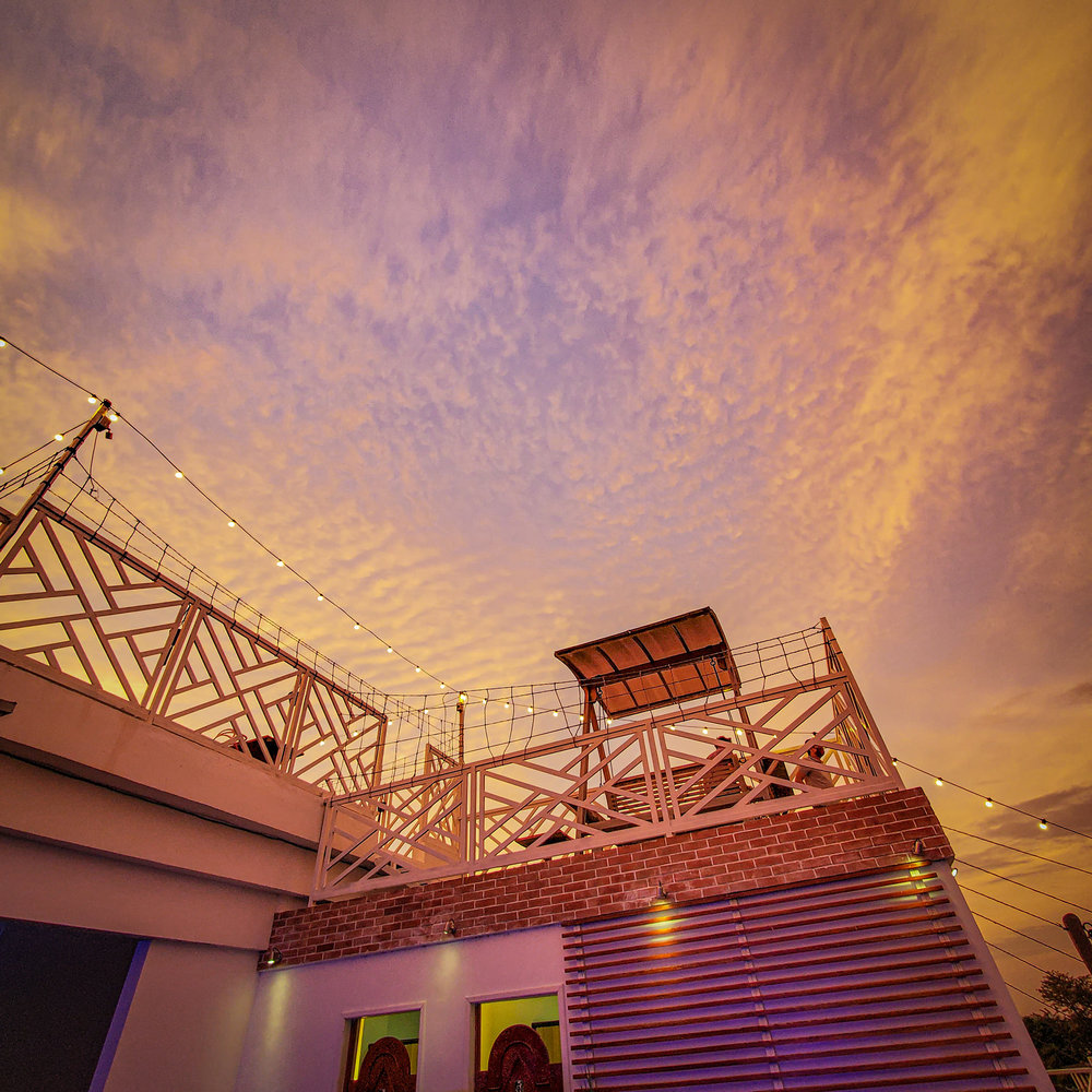 rooftop alfresco area during sunset