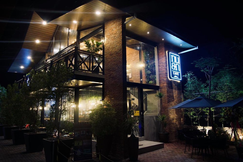 restaurant front and sign during night time