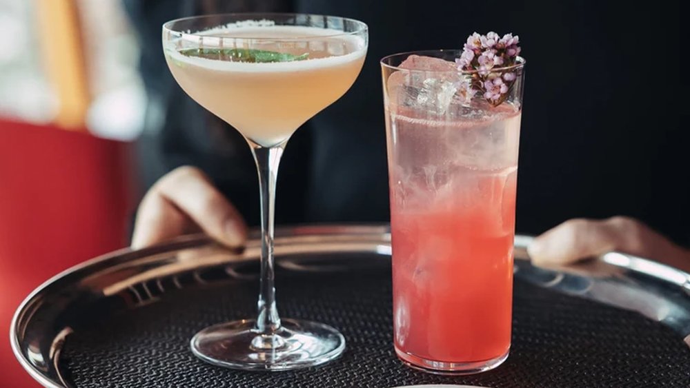 Match your colourful cocktail to the hues of the sunset. Image credits to Klook