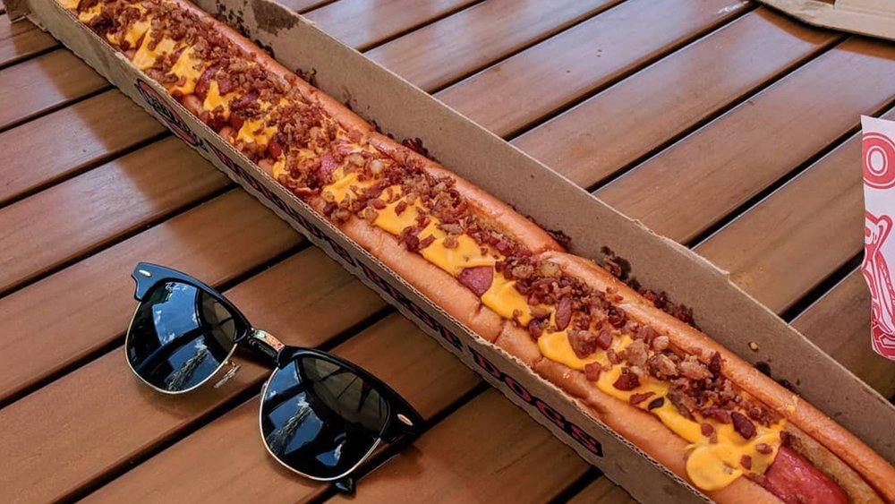 There’s nothing like a 2-foot bacon cheesedog after a long day at the park. Credit: jurassicfoodies