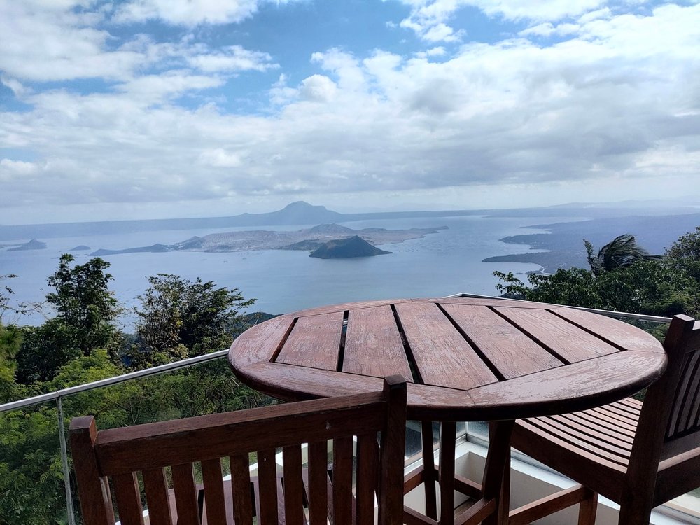 balcony view of taal volcano and lake