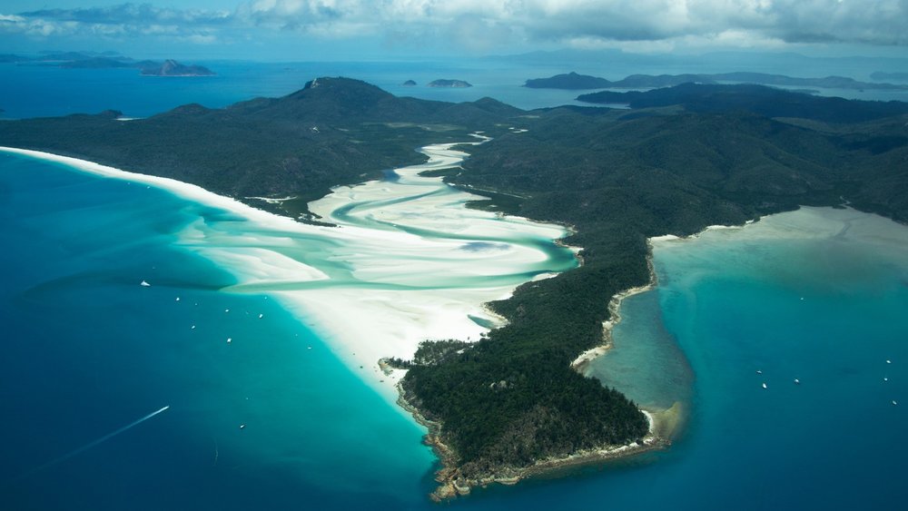 Have a splashing awesome day at Whitehaven Beach! Photo by Sofia Cerqueira on Unsplash