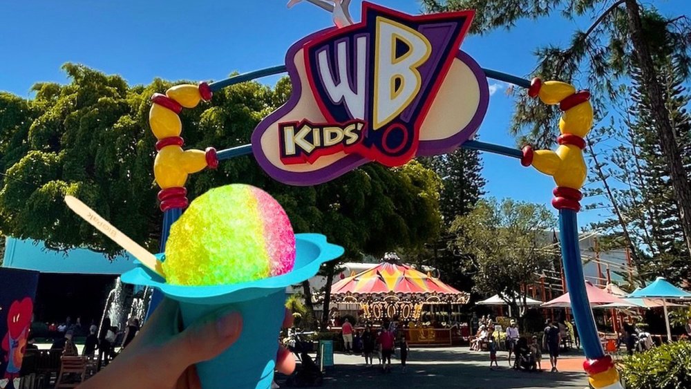 Cool off with the very colourful and tasty snow cone at one of the in-park carts. Credit: movieworldaus