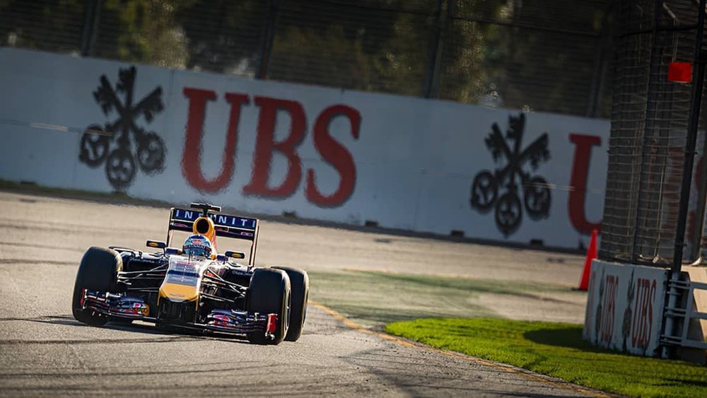 See cars race at lightning speed along a 5,279 kilometre-long race track. Credit: paulhammond.photographer