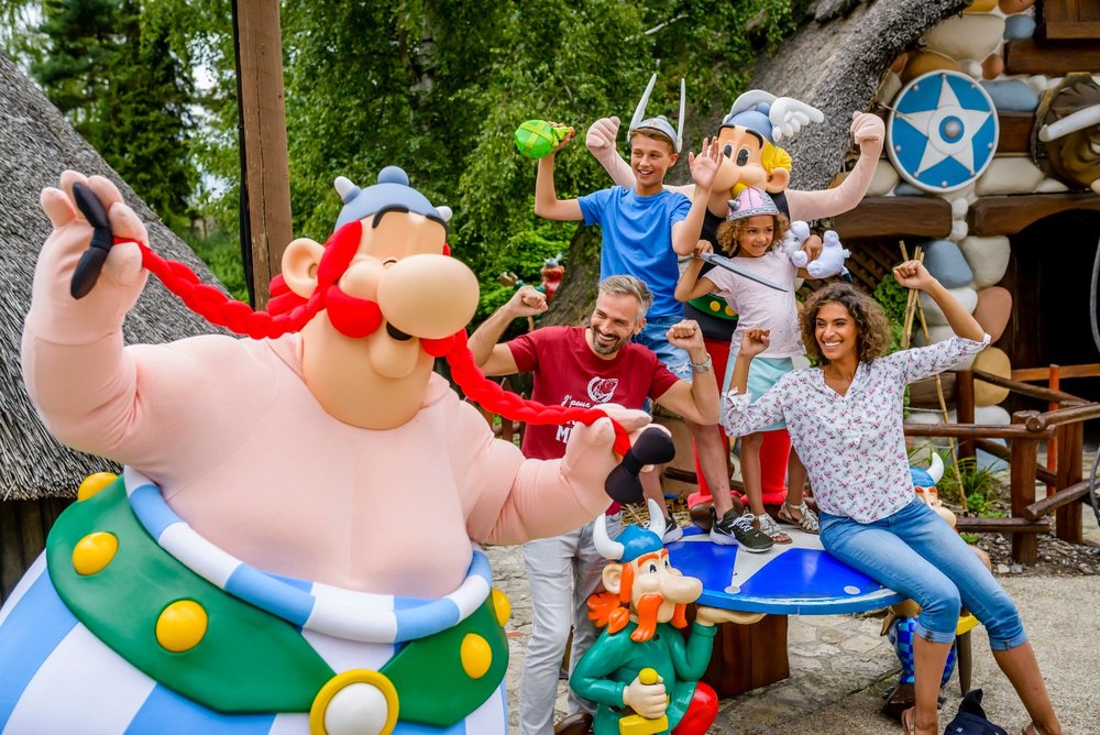 Tourists posing for a photo inside Parc Astérix