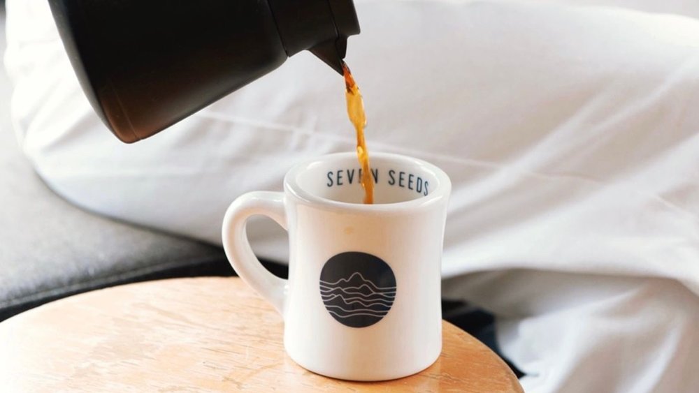 Enjoy a classic warm cup of delicious coffee from Seven Seeds! Image Credits: @7seedscoffee