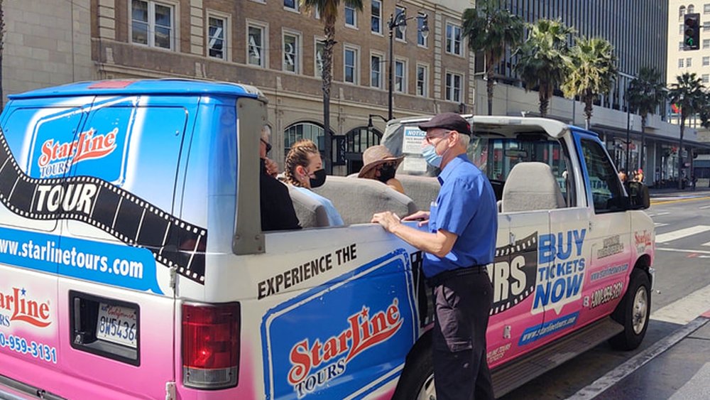 Feel the sun and the breeze on open-top tour buses!