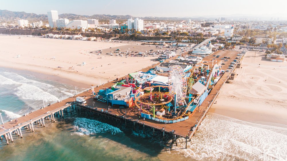Want to go on rides, learn how to trapeze, or just chill along the coast? Santa Monica Pier has it all. Credit: Matthew LeJune