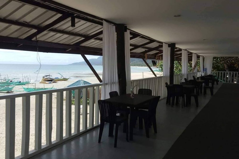 open restaurant with beach view