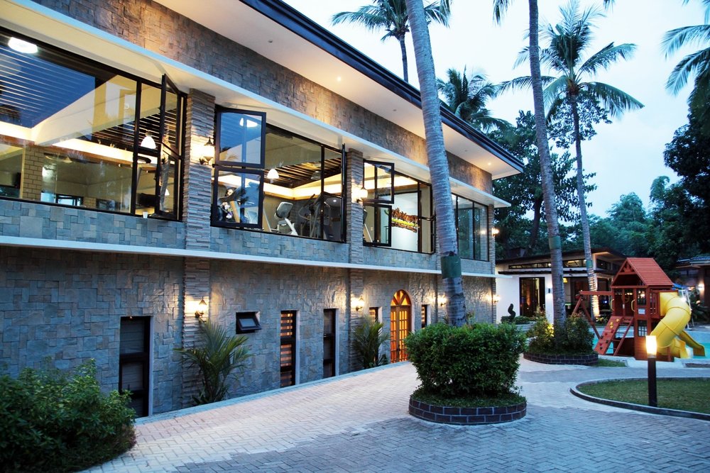 gray brick exterior of resort building