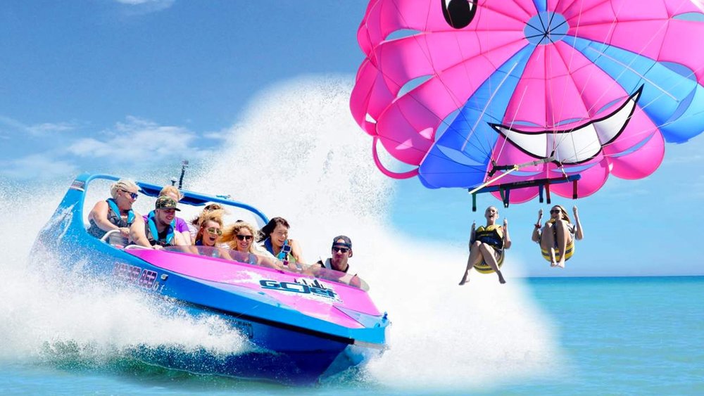 Parasail with a friend over the broad waters of the Gold Coast.