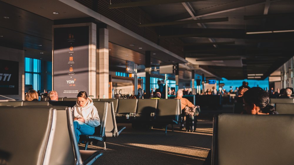Keep all your documents sorted out to avoid problems at one of the busiest airports in the world. Credit: Rayhan Fahmi on Unsplash