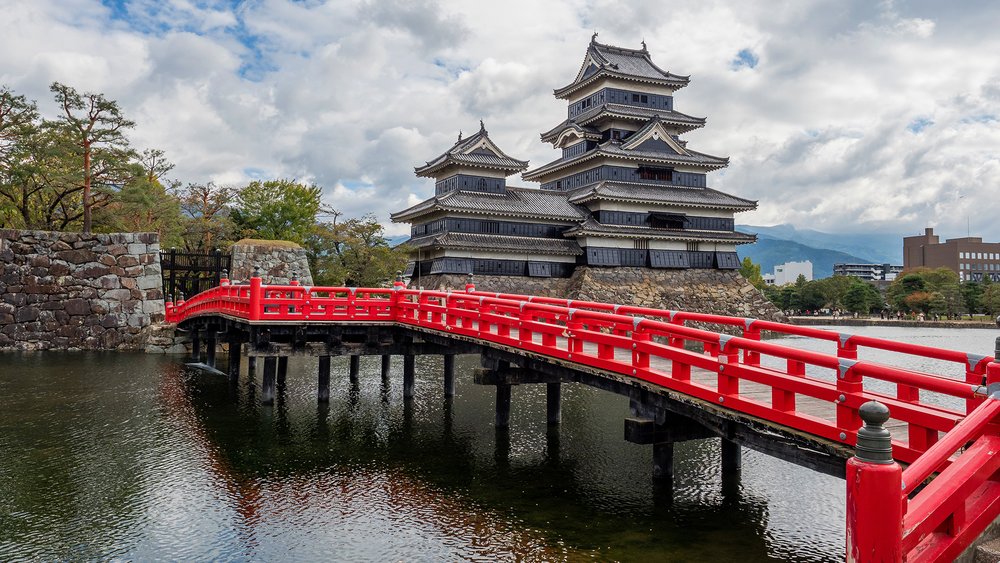 Visit Matsumoto Tenshukaku, one of the only five castles designated as one of the National Treasures of Japan. Credit: Alexander Schimmeck on Unsplash