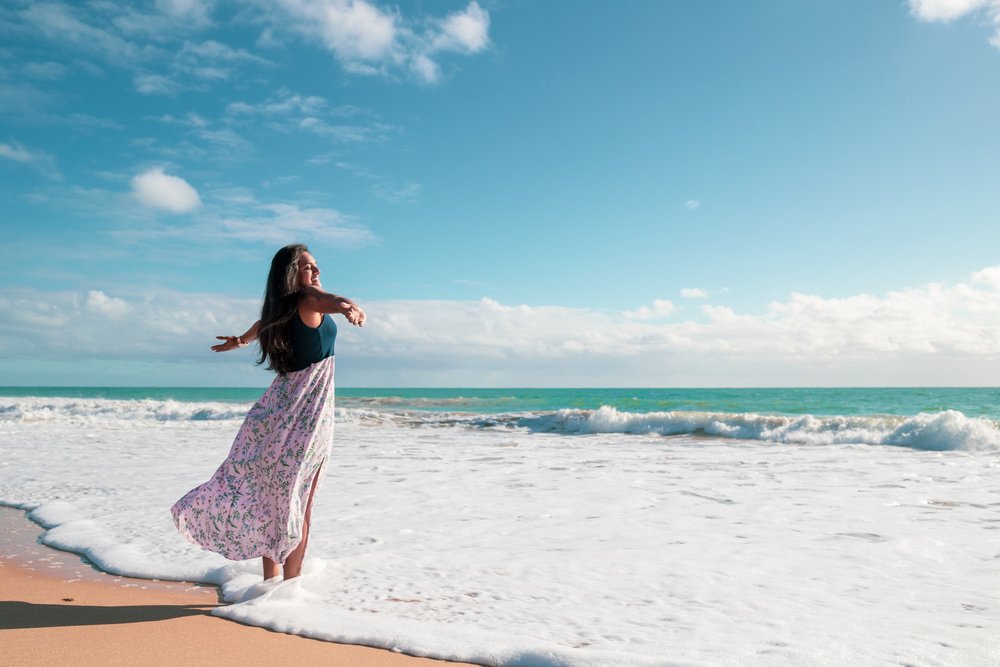 Woman enjoying her time on the beach