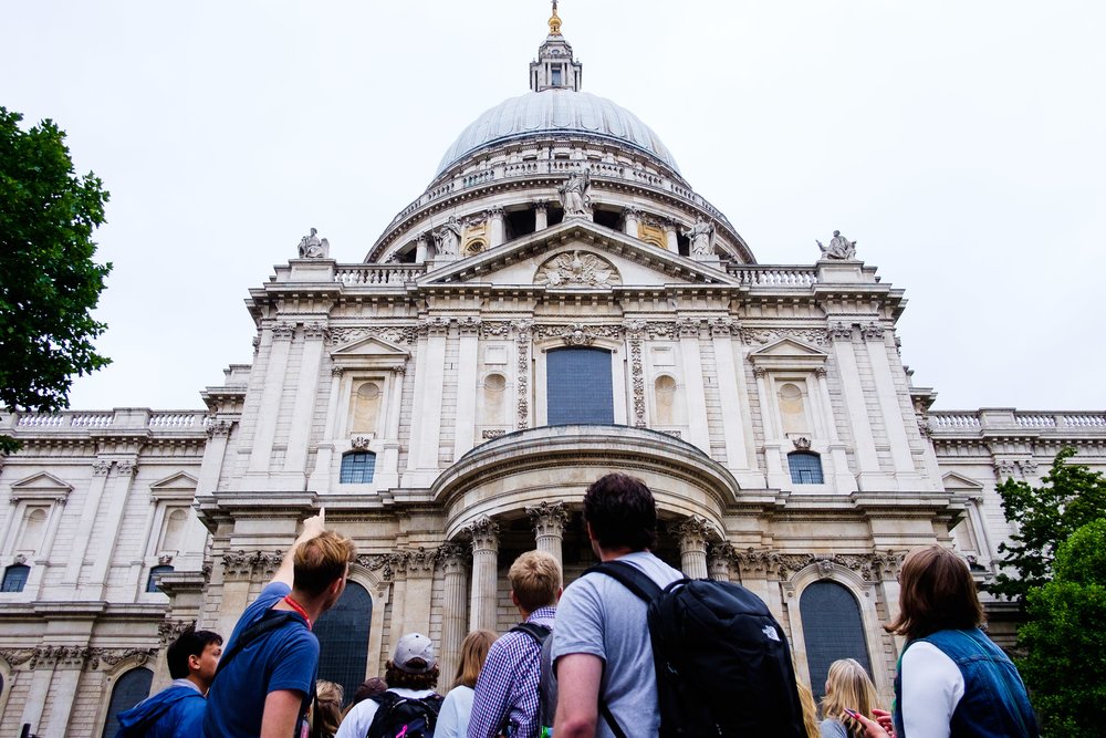 tourists in front of st pauls cathedral london UK