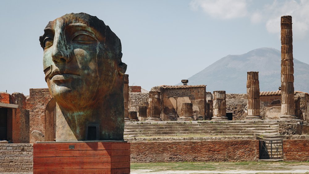 Travel to the south of Italy and discover the well-preserved ruins of Pompeii. Photo by Nick Night
