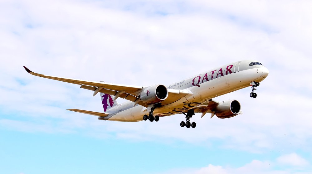 qatar airways airplane in the sky