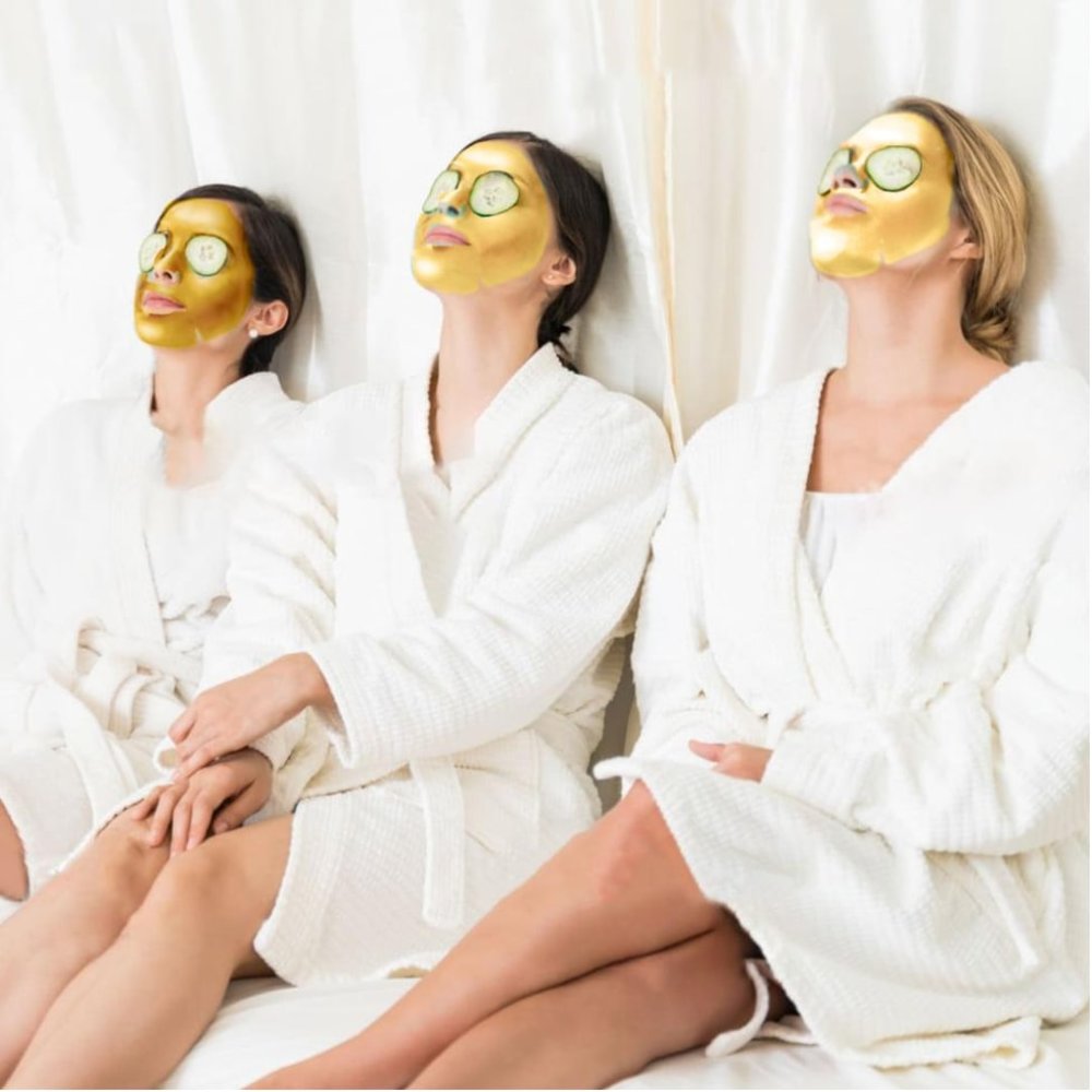 Group of women in robe and facemask