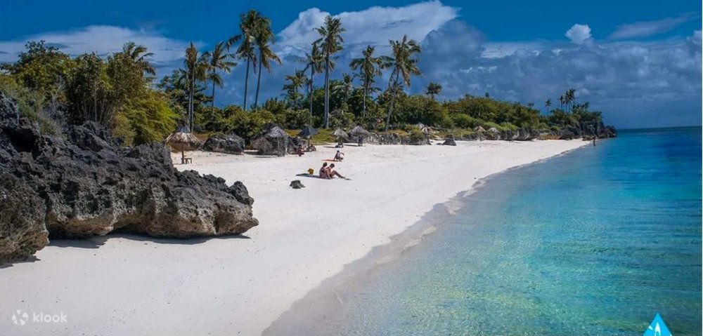 crystal blue water and white fine sand