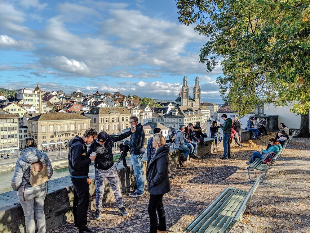 a group of people at lindenhof hill zurich switzerland