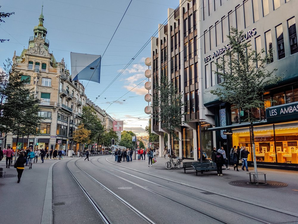 crowds wandering around bahnhofstrasse zurich switzerland