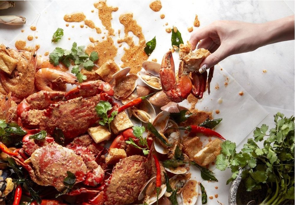 Buttered Crabs and Sea food in the table