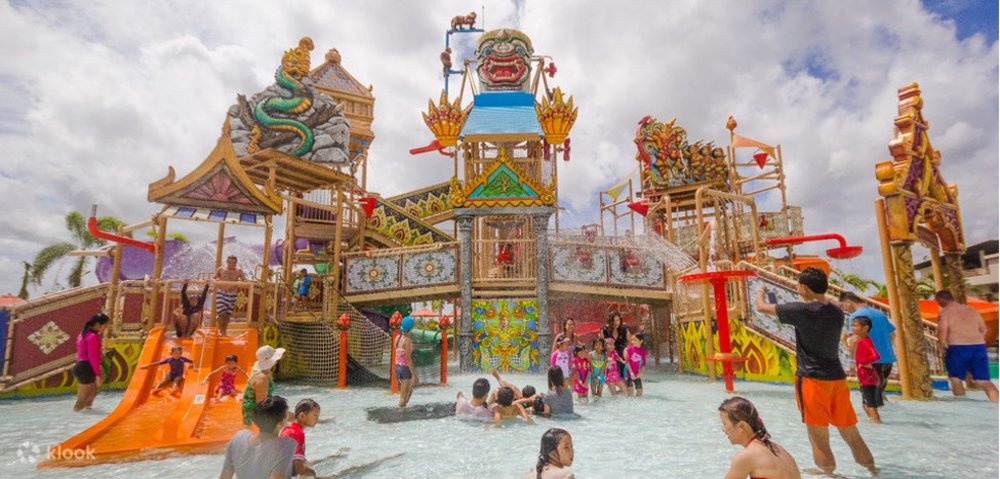 People having fun and playing in the pool