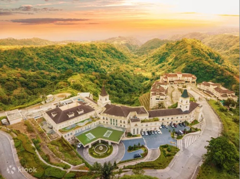 top view of a hotel surrounded with mountains