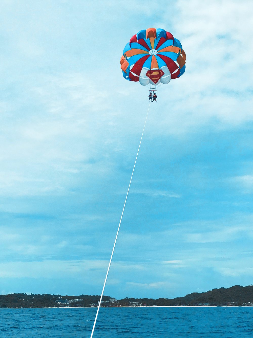 Tourists parasailing in Boracay