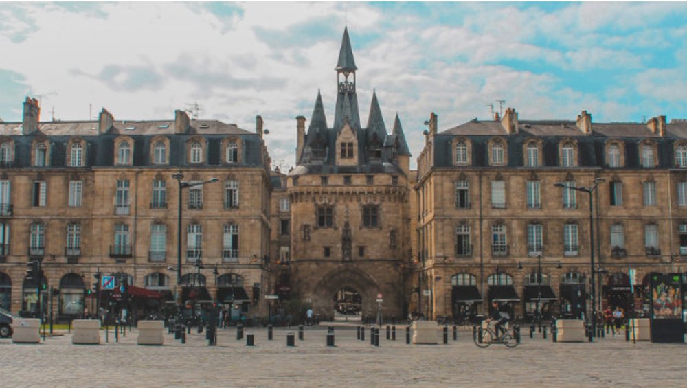 Enjoy a walk through the historic Place de la Bourse