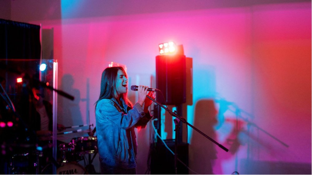 Girl singing in videoke