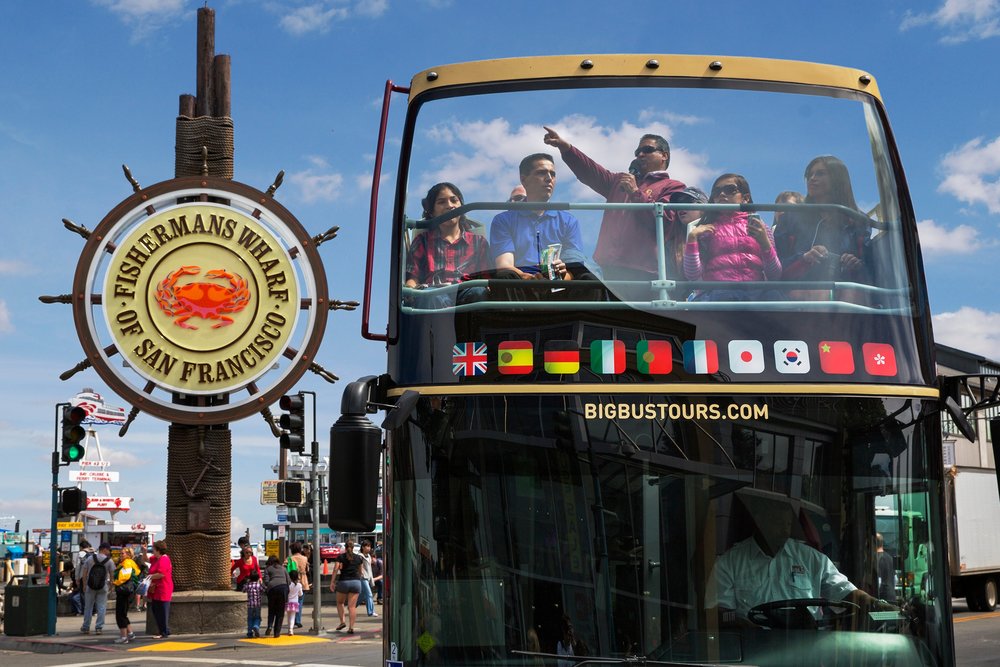 tourists onboard the hop on hop off big bus san francisco