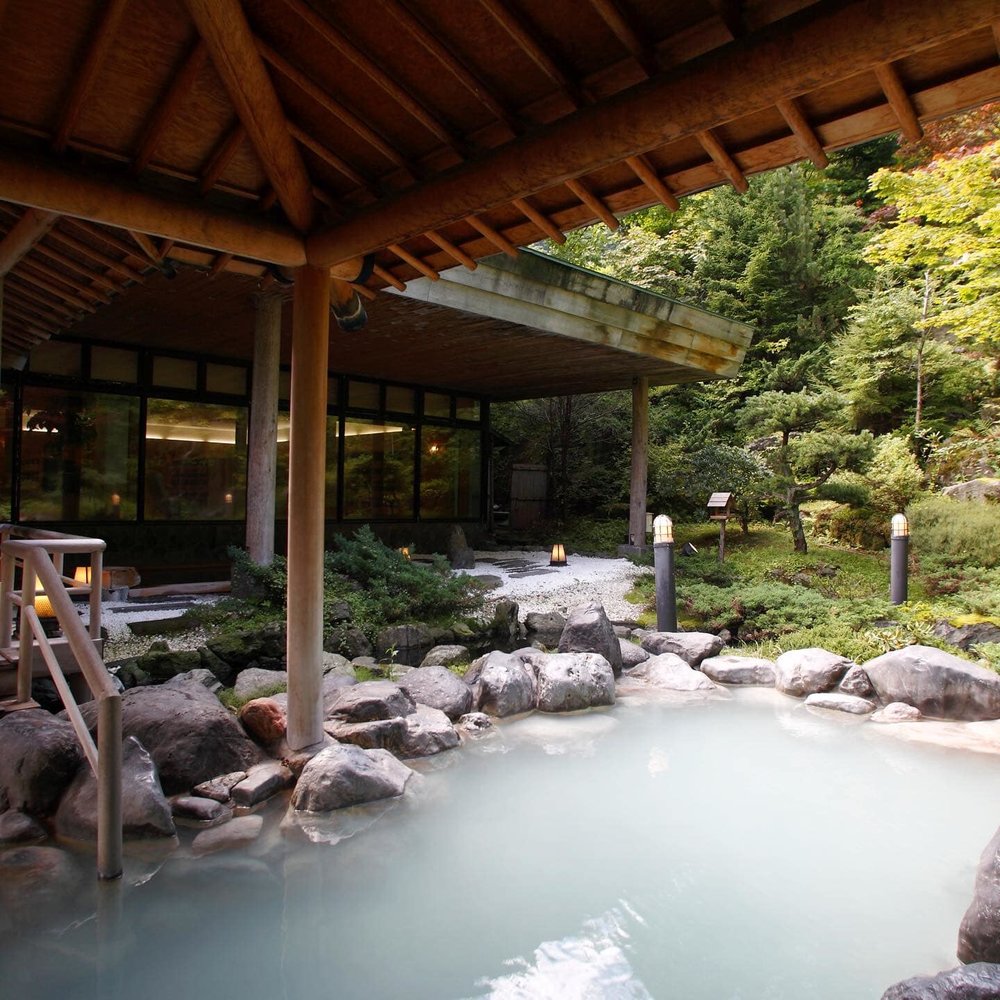 Man made bath with rocks on the side