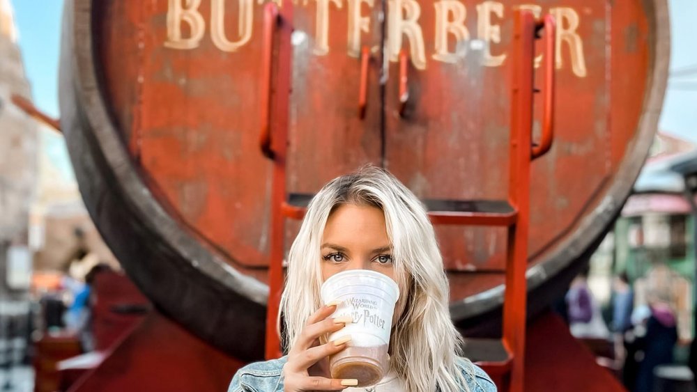 Snap your frothy ‘stache with butterbeer! Credits: @shetakesontheglobe