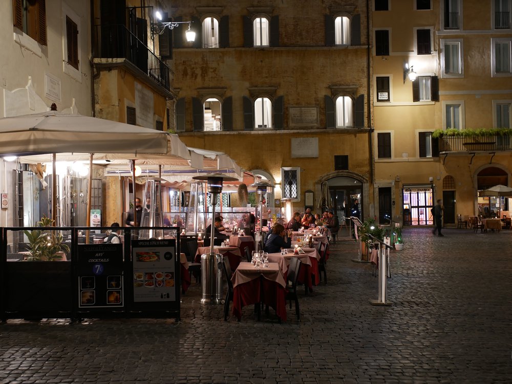 a restaurant in Rome at night