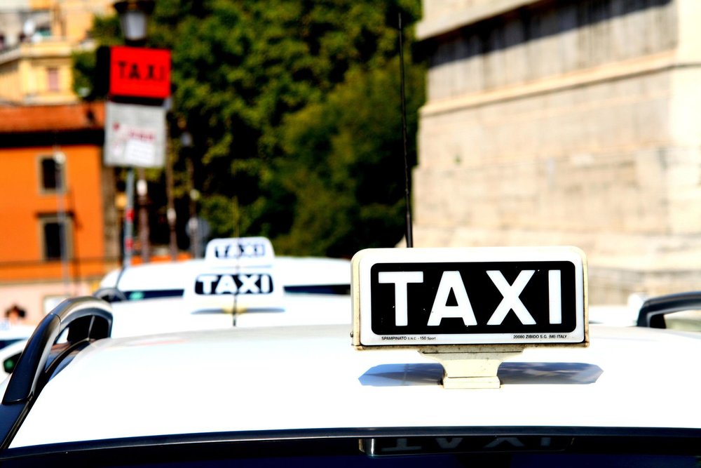 white taxis lined up