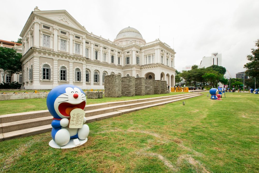 Museum facade with Doraemon statue on the ground